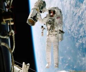 Astronaut during a space mission using a backpack propulsion puzzle