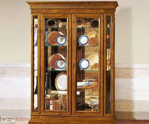 Display or glass cabinet with decorative objects, closed and glazed furniture puzzle