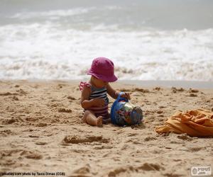 Girl playing on the beach puzzle