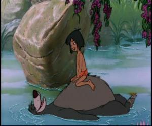 Mowgli above the belly of his friend in the river Balooo puzzle