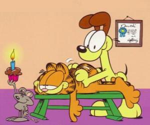 Odie makes Garfield a massage, while a mouse with a candle illuminates them puzzle