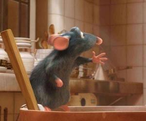 Rémy enjoying in the preparation of a dish in the kitchen of the restaurant puzzle