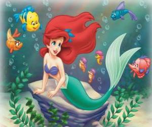 The Little Mermaid Ariel dreaming with her prince charming beside her fish friend Flounder puzzle