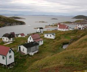 Aerial view of a small town with church and wooden houses puzzle