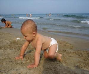 Baby crawling on the beach puzzle