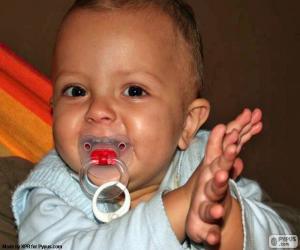 Baby with his pacifier puzzle