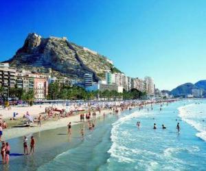 Beach Scene - People sunbathing while puzzle