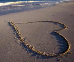Big heart drawn in the sand puzzle