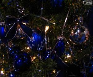 Blue balls decorating a Christmas tree puzzle