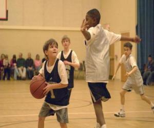 Boy, basketball player with a ball puzzle