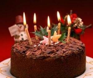 Cake with five candles for the celebration of the birthday puzzle