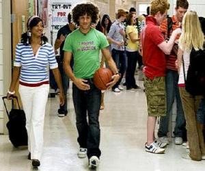 Chad (Corbin Bleu) and Taylor (Monique Coleman) in the corridor of the institute puzzle