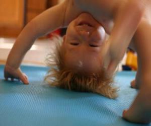 Child doing the nacked somersault puzzle