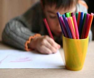 Child drawing a picture puzzle