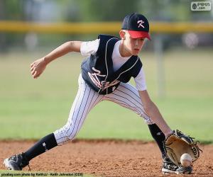 Child playing baseball puzzle