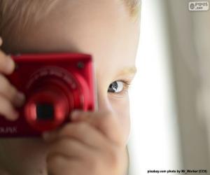 Child with photo camera puzzle