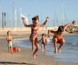 Children playing on the beach puzzle