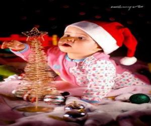 Children playing with the Christmas tree puzzle