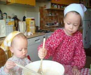 Children preparing a cake as a surprise gift for mom puzzle