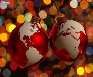 Christmas balls decorated with the world map puzzle