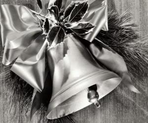 Christmas bell decorated with holly leaves and a ribbon with a big bow puzzle