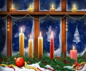 Christmas candles lit in front of a window puzzle