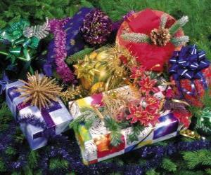Christmas gifts adorned with ribbons and leaves of fir puzzle