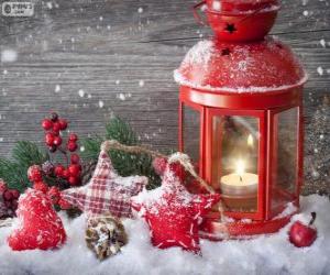 Christmas lamp with burning candle and holly decorations puzzle