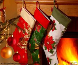 Christmas socks with decoration and hanging on the wall of the chimney puzzle