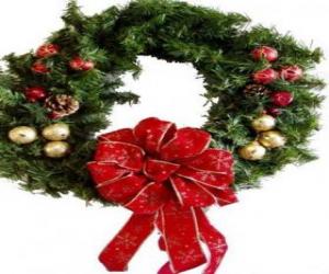 Christmas wreath decorated with a large ribbon and balls puzzle