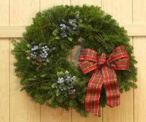 Christmas wreath hanging on the door of a house puzzle