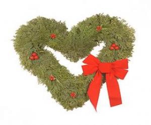 Christmas wreath heart-shaped leaves formed by fir puzzle