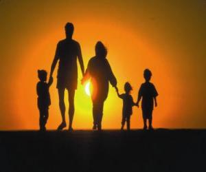 Family, father, mother and children walking at dusk tre puzzle