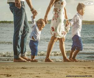 Family walking along the beach puzzle