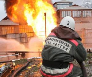 Firefighter with a hose pouring water puzzle