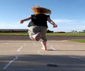 Girl playing hopscotch puzzle