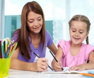 Girl playing to paint with her mother puzzle