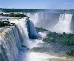 Great waterfall with its many falls and clouds of steam rising puzzle