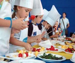 Group of children making cooks puzzle