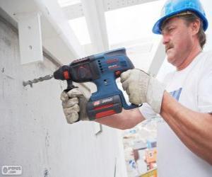 Handyman prepared to work with the drill puzzle