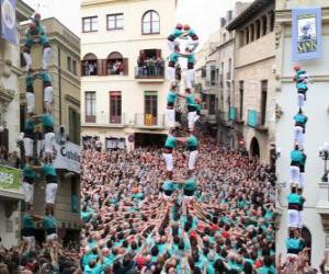 Historical human tower, 'castell', two persons for eight levels, raised and discharged by Castellers de Vilafranca the November 1, 2010 puzzle