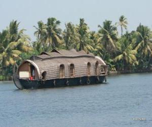 Houseboat on the river, a boat designed as housing puzzle