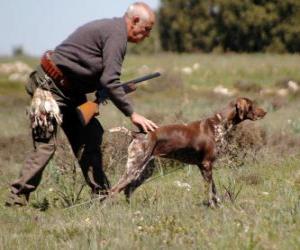 Hunter hunting with his dog puzzle