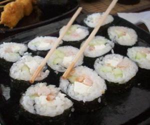 Japanese food with chopsticks, it is known as maki because is sushi rolled with seaweed puzzle