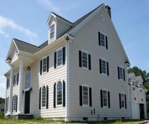 Large manor house with two floors and attic windows puzzle