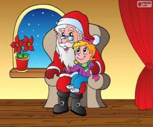 Little girl with Santa Claus puzzle