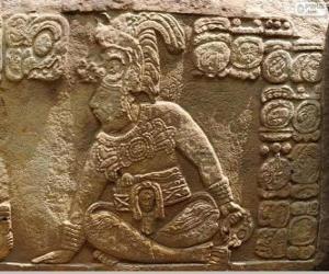 Mayan drawings carved on a stone puzzle