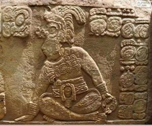 Mayan drawings carved on a stone puzzle