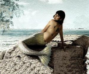 Mermaid sitting on a rock beside the sea puzzle