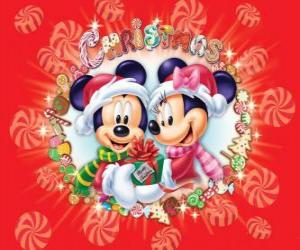 Mickey and Minnie Mouse wraped up warm with Santa Claus hats puzzle